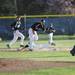 Huron Max Teener slides into second in the game against Pioneer on Monday, May 13. Daniel Brenner I AnnArbor.com